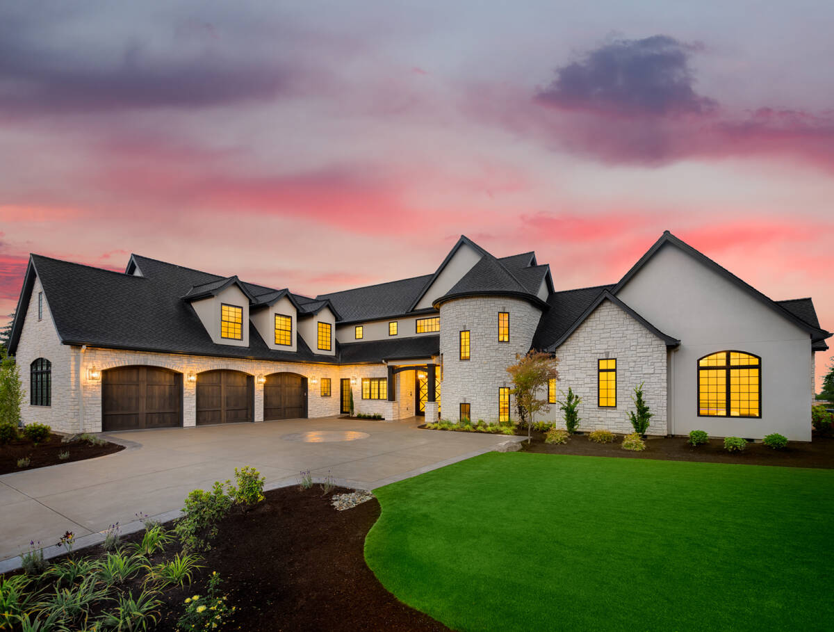 Stunning luxury home exterior at sunset